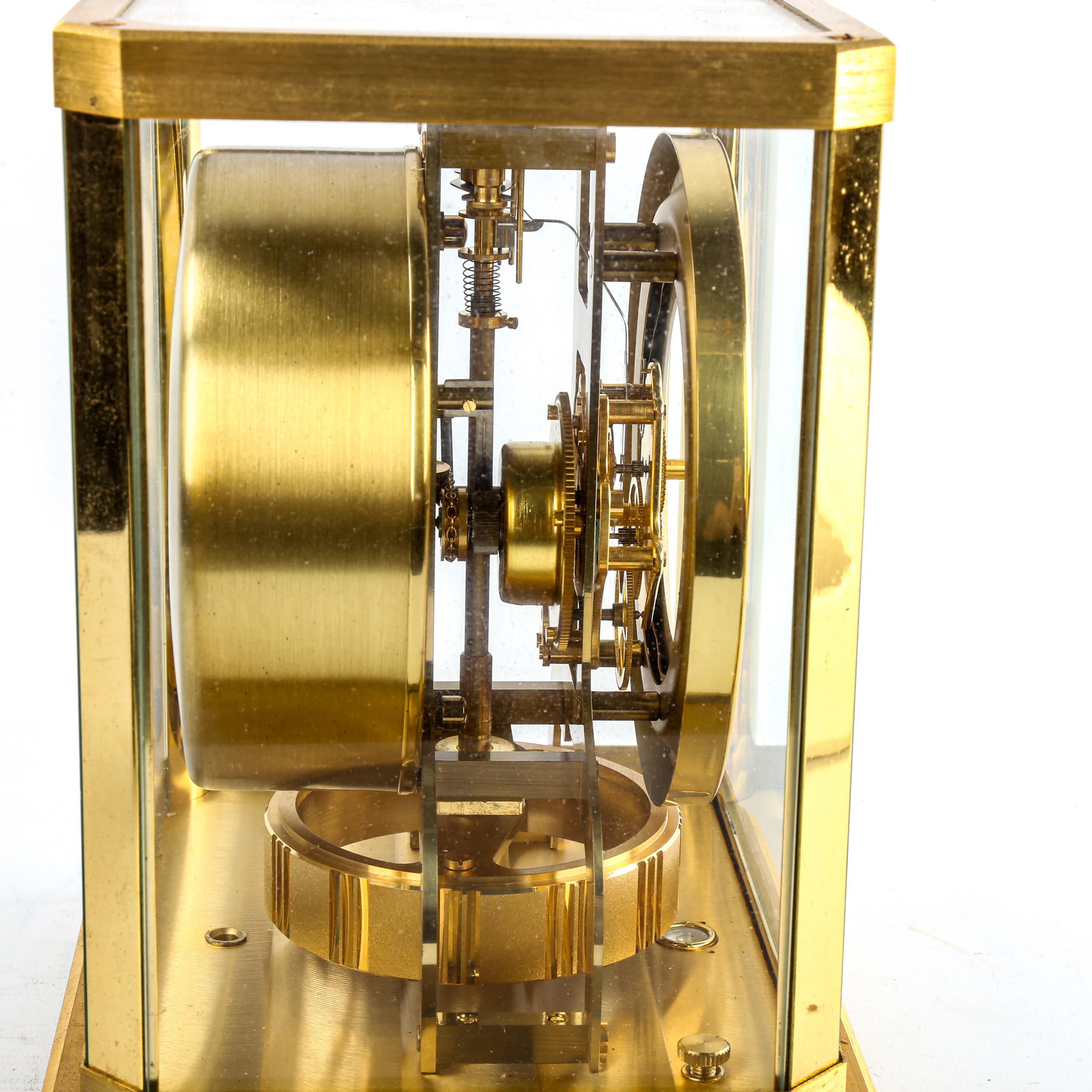 JAEGER LECOULTRE - a Vintage brass-cased Atmos clock, white chapter ring with gilt quarterly - Image 5 of 6