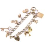 A 9ct gold curb link heart padlock charm bracelet, with 10 charms, hallmarks Birmingham 1977,