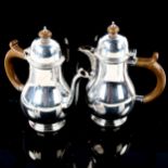 A George VI matching silver bachelor's coffee pot and hot water jug, baluster form with turned