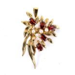 A late 20th century 9ct gold garnet and pearl floral spray pendant, set with oval mixed-cut garnets,