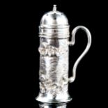 An Edwardian Art Nouveau silver sugar caster, relief embossed Greek mythological scene depicting