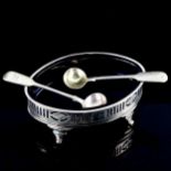 A George V silver boat-shaped salt cellar, in George III style, pierced and engraved gallery with