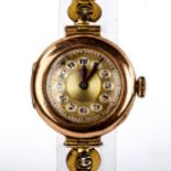 A lady's Vintage 9ct gold cased mechanical wristwatch, gilt dial with Arabic numerals and blued