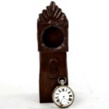 A stained oak pocket watch stand, modelled as a longcase clock, overall height 23cm, pocket watch