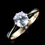 An 18ct gold 0.85ct solitaire diamond ring, set with unmarked plain claw setting with old European-