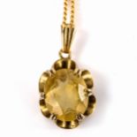 A late 20th century 9ct gold citrine pendant necklace, set with oval mixed-cut citrine on fine