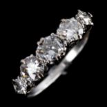 An Antique platinum 5-stone diamond ring, set with old European-cut diamonds, total diamond