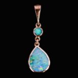 A modern 9ct gold black opal drop pendant, pendant height 28.8mm, 1.4g No damage or repairs,