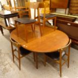 A mid-century G Plan teak oval extending dining table, together with a set of 6 matching chairs,