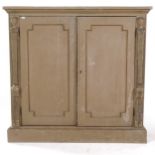 A painted 2-door cupboard, with adjustable shelves and figural carved pilasters, W113cm, H107cm,