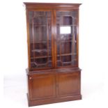 A reproduction mahogany 2-section bookcase, W107cm, H183cm, D40cm