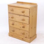 A modern pine chest of 4 long drawers, W75cm, H102cm, D42cm