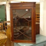 A 19th century mahogany hanging corner cabinet, with lattice glazed door, W64cm, H93cm