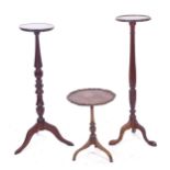 2 mahogany torcher stands, and a walnut tripod occasional table (3)