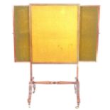 A 19th century mahogany fire screen, with 2 slide-out panels, on sabre legs, W58cm, H118cm
