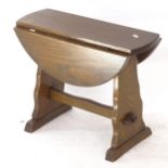 A small oak drop leaf swivel-top occasional table, W50cm, H40cm, D22cm