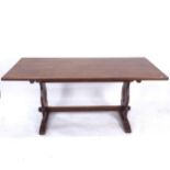 An oak rectangular refectory table, raised on lyre-end supports, L168cm, H75cm, D75cm