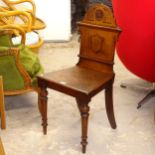 A Victorian mahogany shield-back hall chair