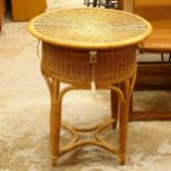 A mid-century circular wicker sewing basket, W52cm, H61cm