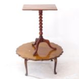 A Victorian mahogany tilt-top table, on tripod base, and a 1930s mahogany circular coffee table,