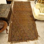 An Antique red ground Persian runner, 280cm x 110cm (A/F)