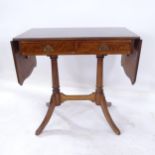 A reproduction crossbanded walnut sofa table, with 2 frieze drawers, W80cm, H74cm, D50cm