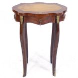A Continental design walnut side table of shaped form, with single frieze drawer, cabriole legs, and