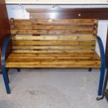 A pine slatted and wrought-iron garden bench, L120cm, H84cm, D56cm