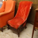 A Victorian mahogany-framed button-back upholstered nursing chair