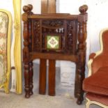 A hardwood 2'6" bed, complete with slats and rails, the carved pierced panelled head and foot boards