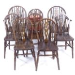 A set of 8 oak and elm-seated wheel-back dining chairs (6 and 2)