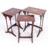 A mahogany nest of 3 occasional tables with shell marquetry decoration