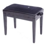 An ebonised rise and fall piano stool, W66cm