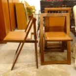 A set of 4 teak folding chairs