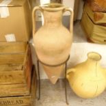 A Grecian style 2-handled oil jar on metal stand, H92cm