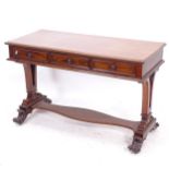 A Regency mahogany library table, with 3 frieze drawers, raised on shaped supports, with scrolled