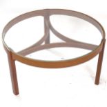 A mid-century circular glass-top teak coffee table, W82cm