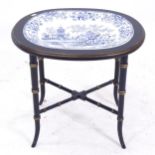 A painted and gilded oval stand, with an inset Victorian blue and white meat plate, W57cm, H50cm