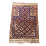 A blue ground Beluchi prayer rug, 125cm x 88cm