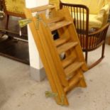 A pine 12-rung loft ladder