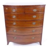 A Regency mahogany bow-front chest, with 2 short and 4 long drawers, on bracket feet, W105cm,