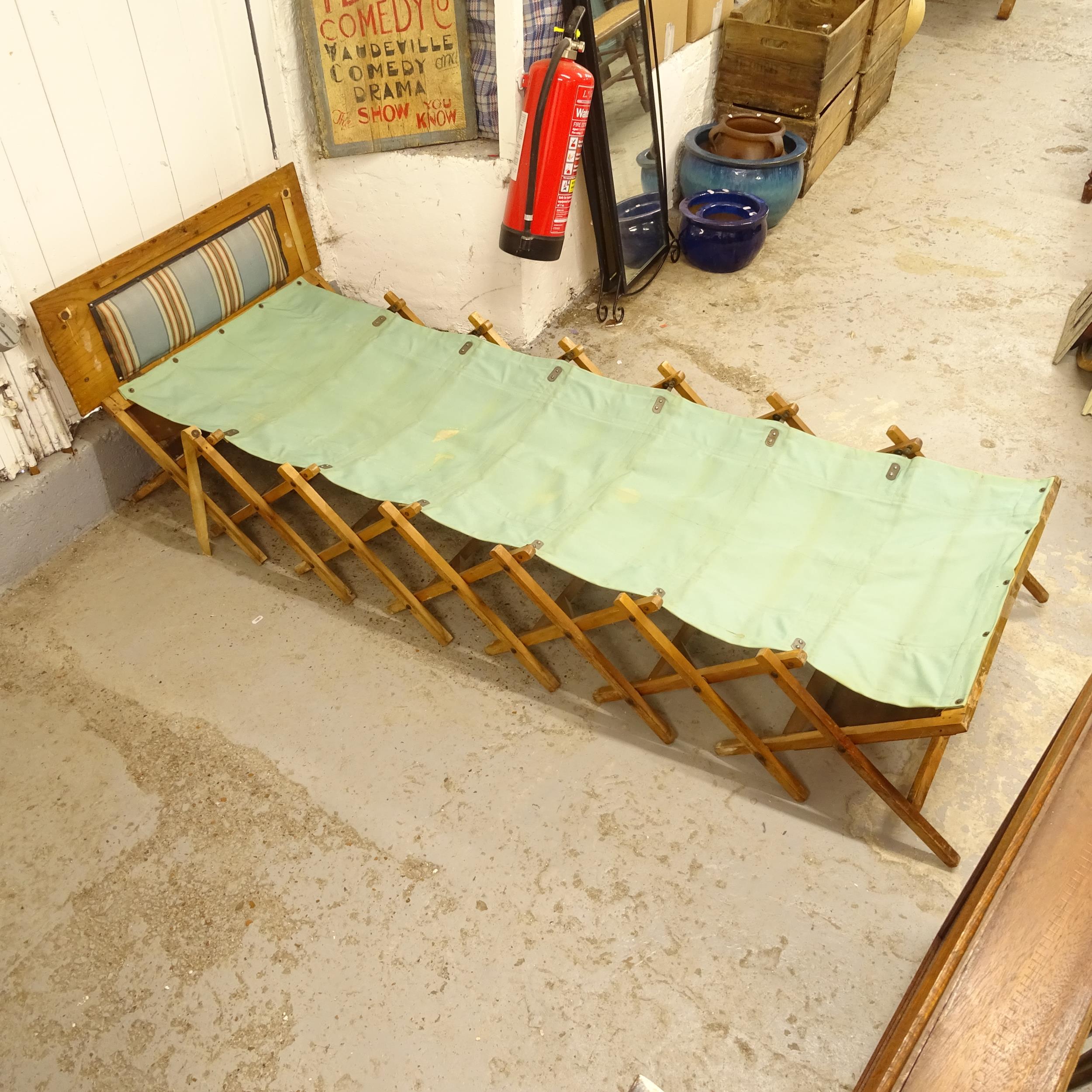 An early 20th century campaign folding bed