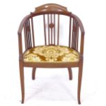 An Edwardian mahogany inlaid bow-arm chair
