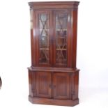 A Regency style mahogany 2-section corner display cabinet, W104cm, H192cm