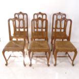 A set of 5 Belgian oak dining chairs, with drop-in rush seats, on cabriole legs