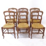 A set of 6 French oak ladder-back and rush-seated dining chairs