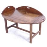 A folding oak butler's tray on stand, W113cm, H67cm, D80cm (folded W87cm, H67cm, D56cm)