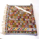 A flatweave Kilim carpet, L296cm x 142cm