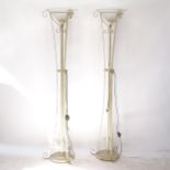 A pair of Grecian style uplighters with glass bowls, H172cm