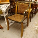 A mid-century bamboo and wrought-iron elbow chair, with a woven cane seat